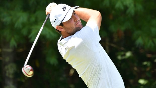 Scottie Scheffler hits his tee shot on the 15th hole during the second round of The Northern Trust golf tournament at TPC of Boston.